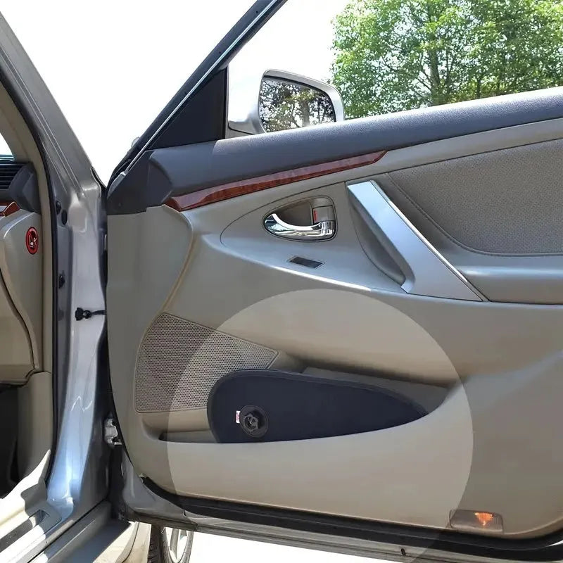 Breathable car window shade stretched on side window with suction cups visible