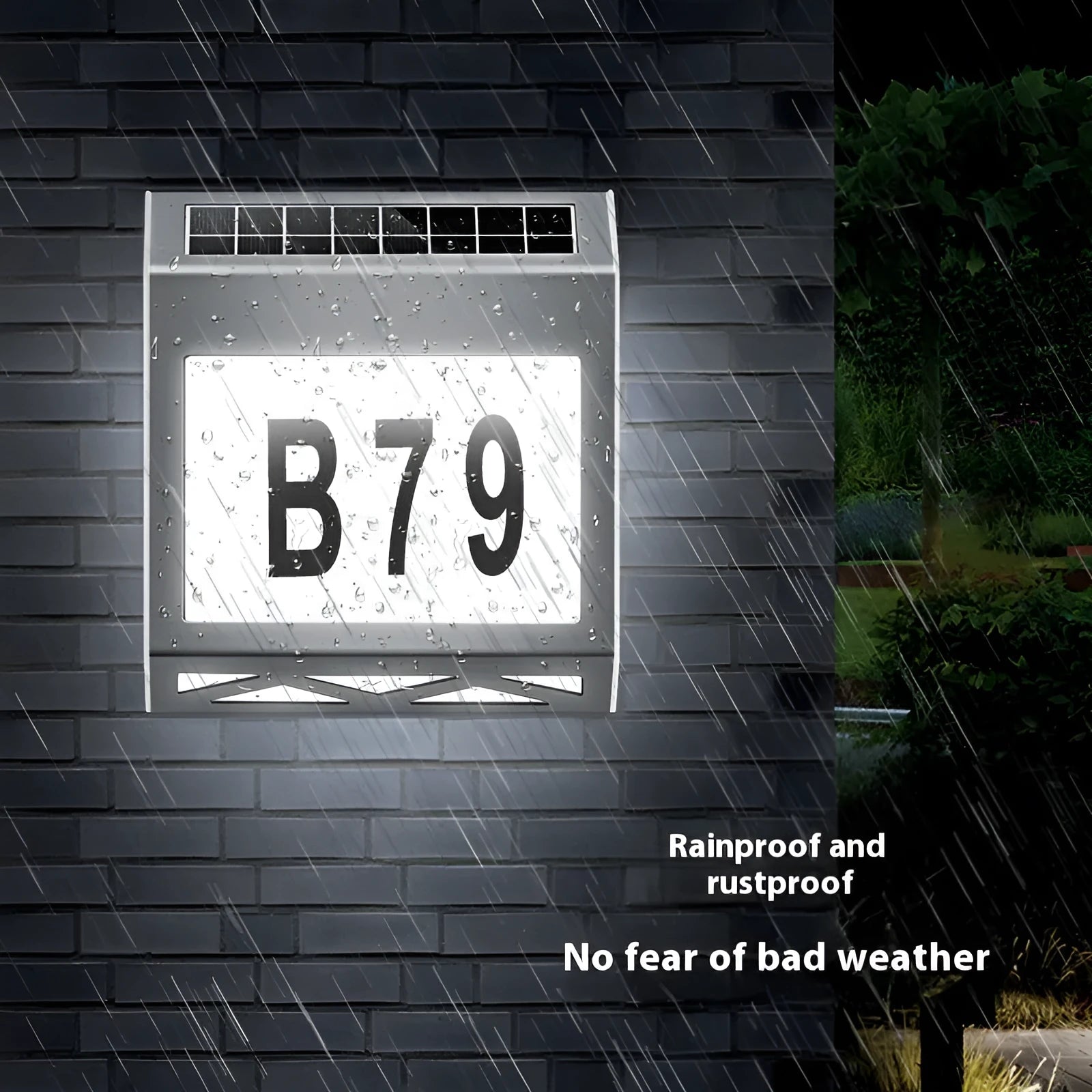 Black solar-powered doorplate light with LED illumination for house numbers measuring 180x50x200mm