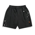 Black men's semi-elastic shorts with a colour button, loose straight-leg cut, and zip fly.