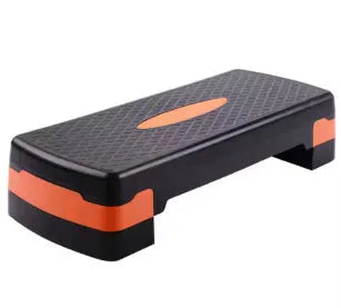 Grey ABS plastic aerobic step platform measuring 68x28x15cm for home fitness and yoga exercises.