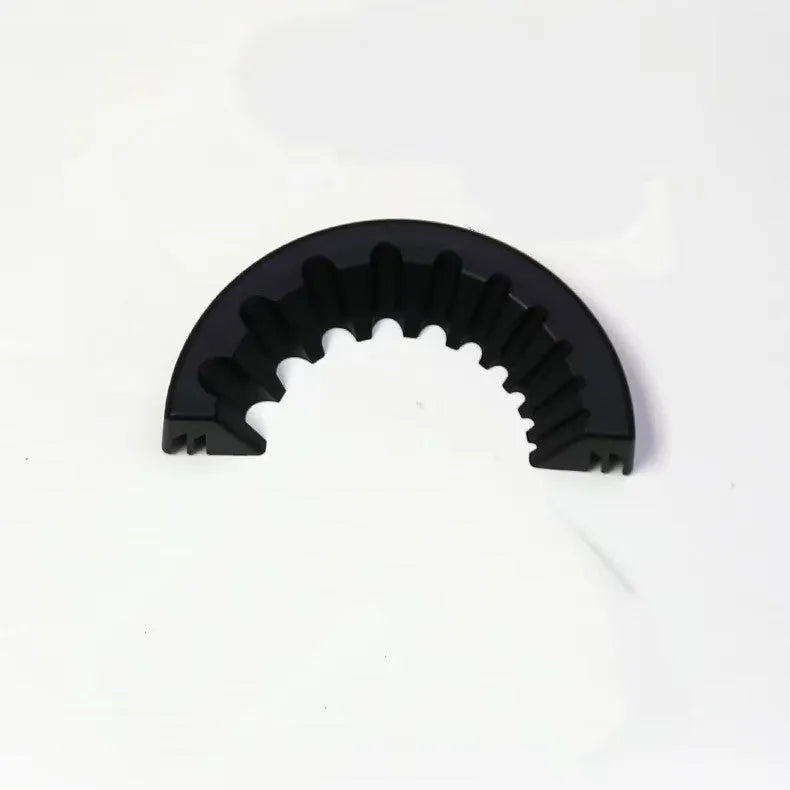 Yellow, green, and black plastic angle grinder bracket holder for sealant cartridges.