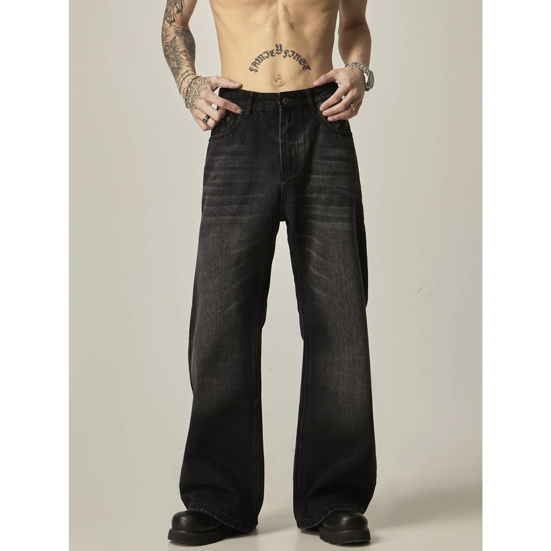 Black retro straight-leg jeans with zip fly opening and loose fit on size chart