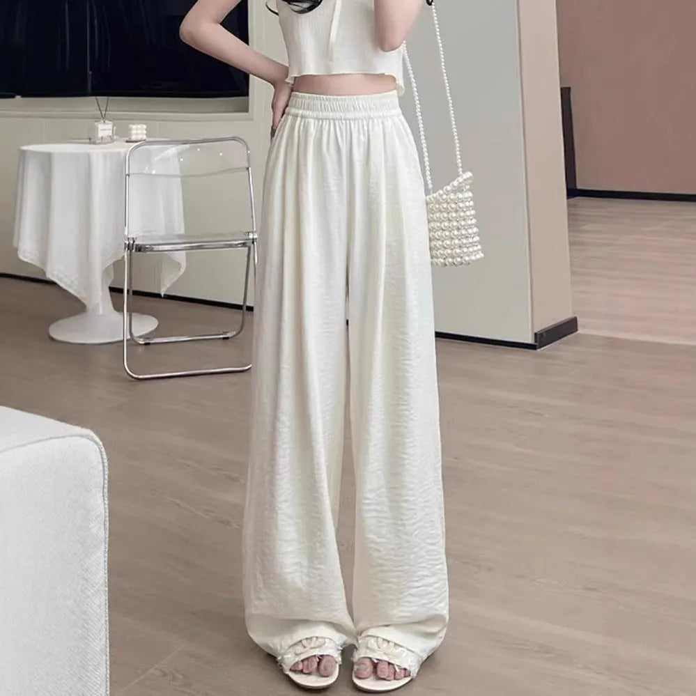 Casual high waist wide leg trousers in milky white, pleated front, loose fit design for women