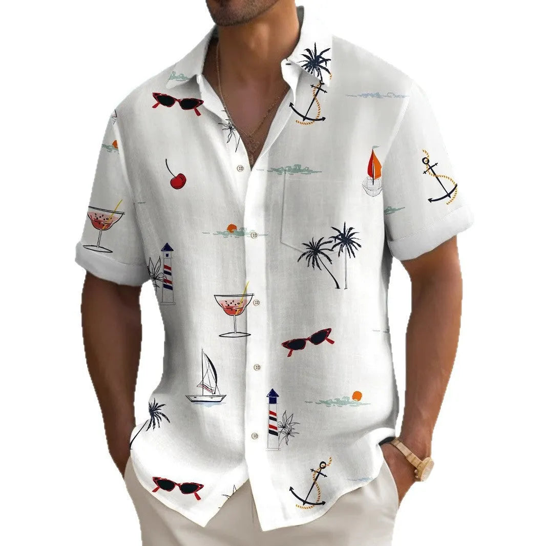 Man wearing a loose fit short sleeve shirt with a colourful digital Hawaiian print pattern.