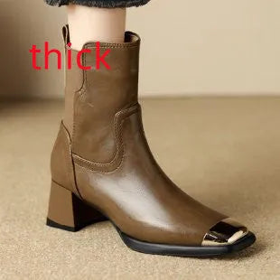 Brown women's Martin boots with side zipper and decorative metal details on a rubber sole.