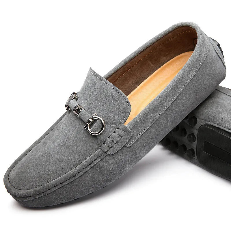 Men's black slip-on cowhide leather shoes with a square toe and flat heel on a white background