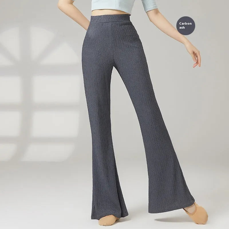 Women's solid colour dance practice trousers in polyester fabric for ballet training.