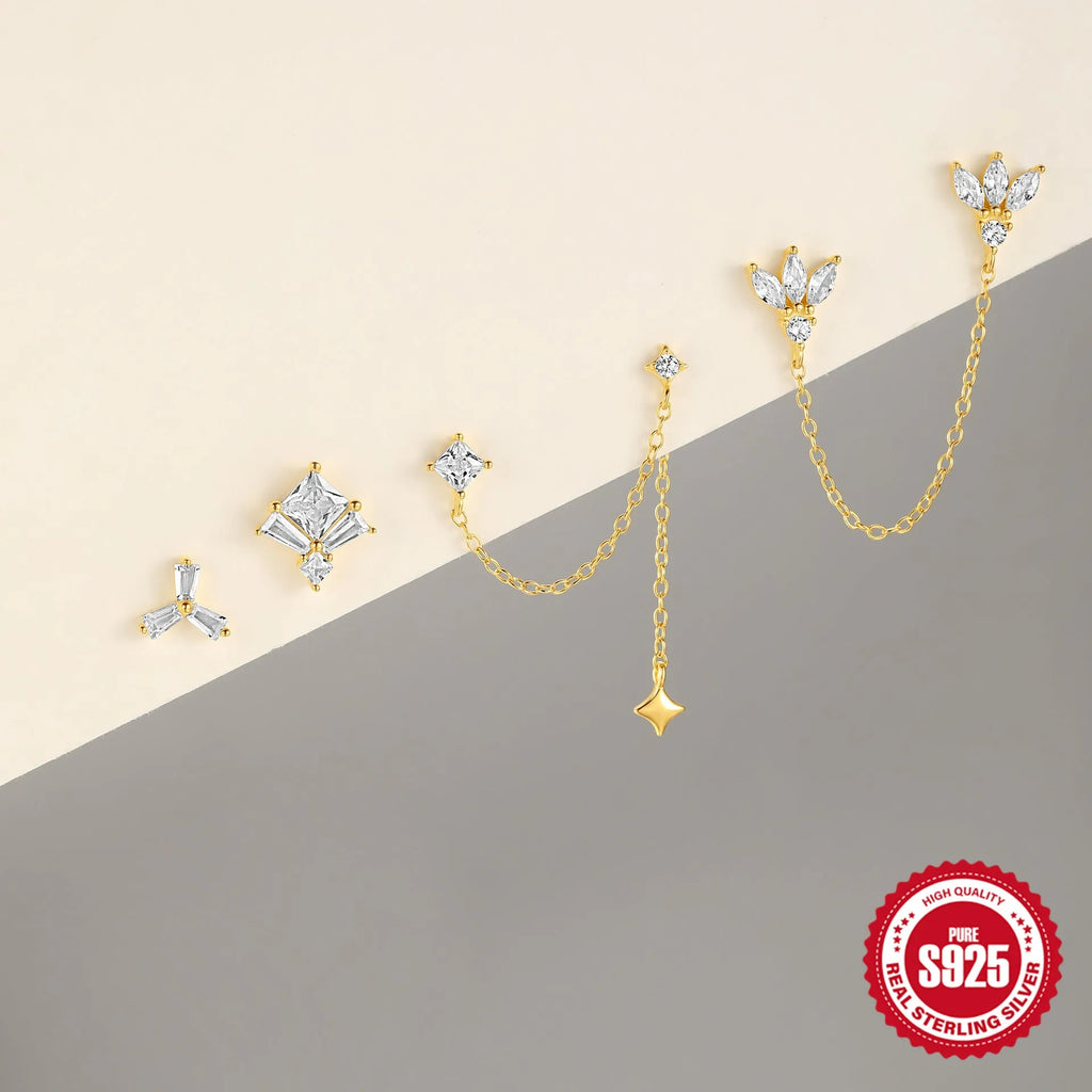 S925 sterling silver geometric stud earrings with inlaid zircon in golden clover, crown, and chain designs.