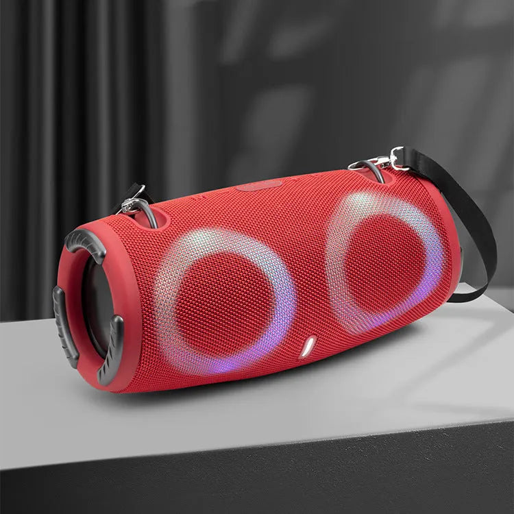 War Drum portable Bluetooth speaker with RGB lights in camouflage colour with carrying strap.