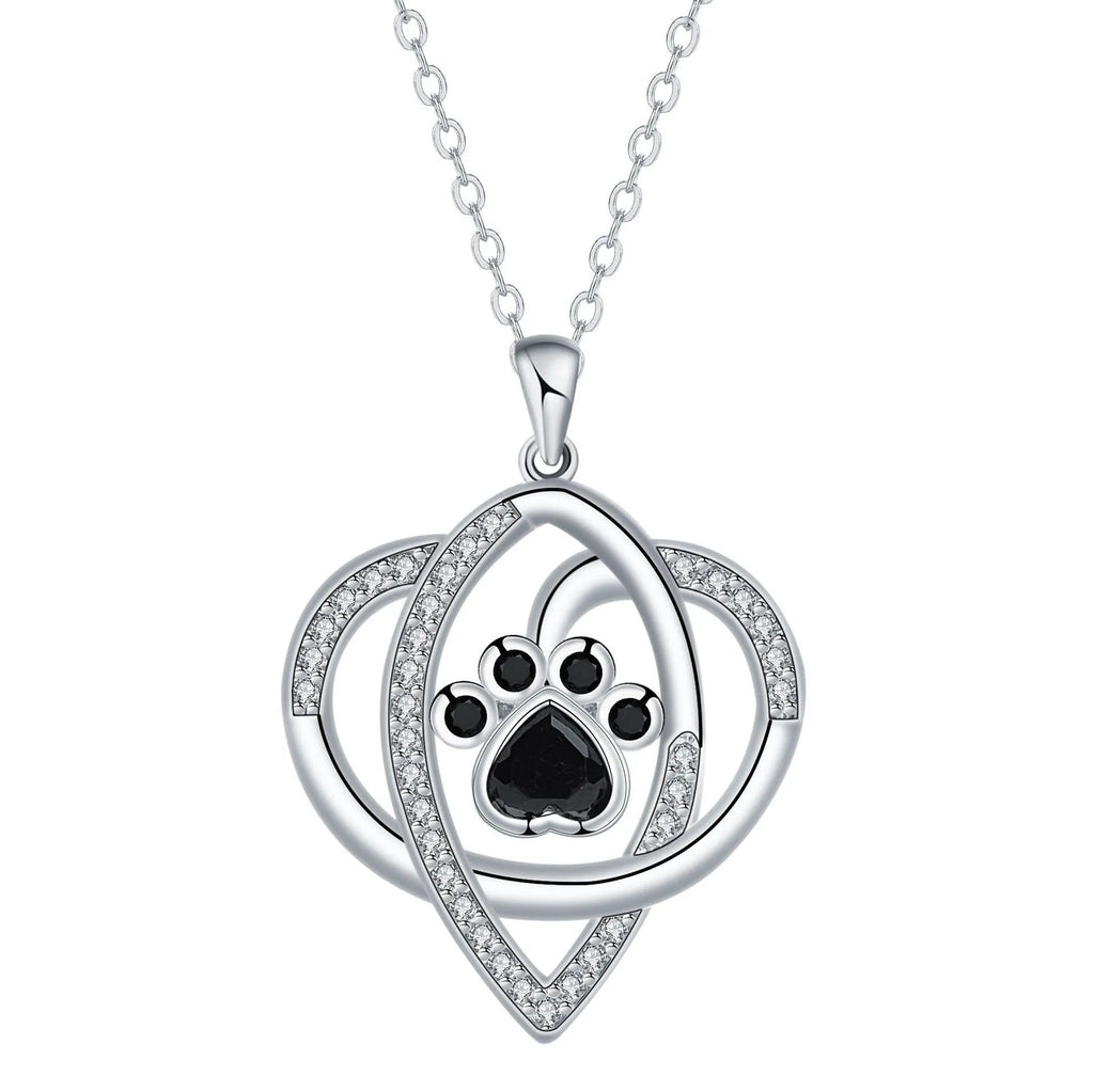Silver tone dog and cat paw print necklace with cross chain design
