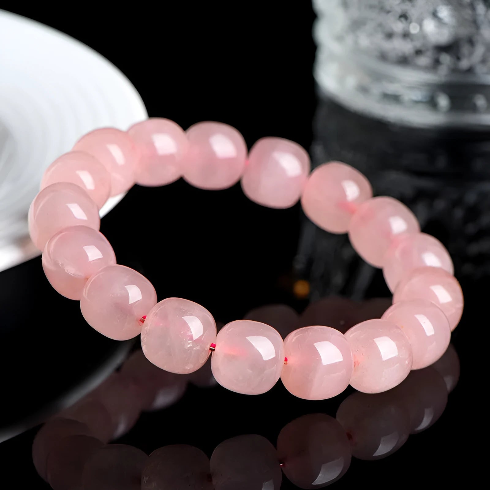 Pink crystal barrel bead bracelet with geometric design and 8 x 10mm bead sizing