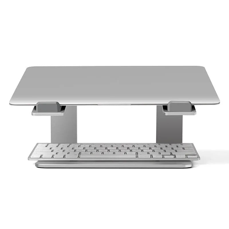 Black aluminium laptop stand on desk supporting silver laptop at improved viewing height