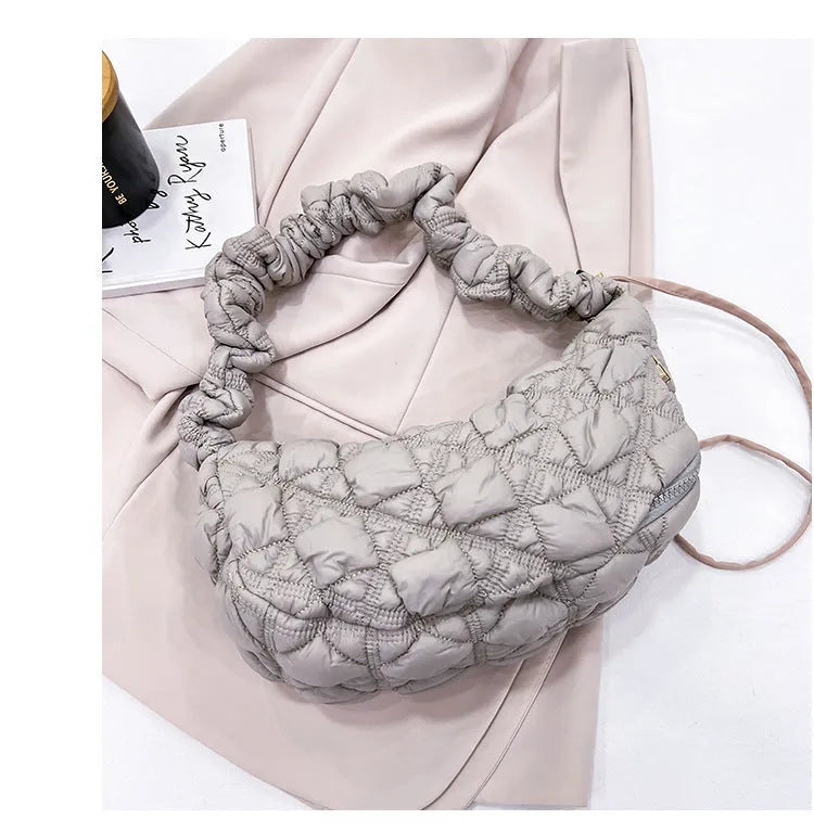 Women's nylon shoulder messenger bag in beige colour showing adjustable strap and dimensions