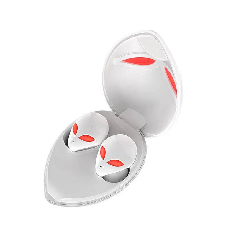Alien-themed Creative Outer T8 Starman black wireless earbuds with red LED lights next to charging case.