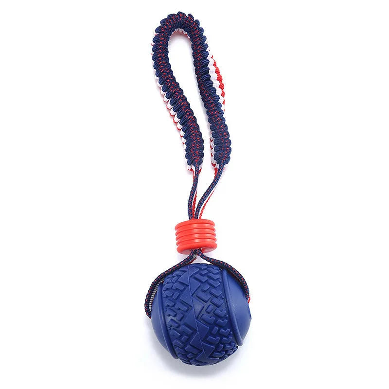 Blue rubber dog ball with rope toy for small dogs showing textured surface and 29cm length
