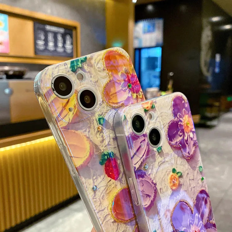 Purple and yellow mobile phone cases with oil painting floral design and inlaid diamond decoration.
