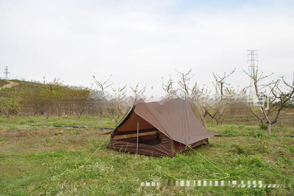 Brown or white A-line cabin tent using hiking canes for support with dimensions 210x150x110cm