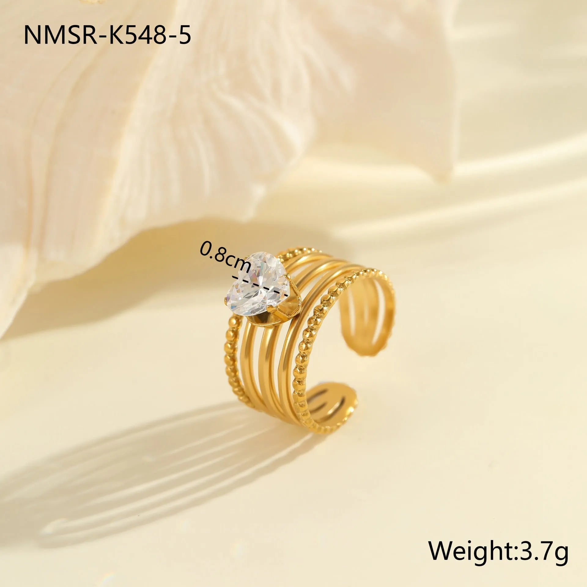 Open mouth geometric stainless steel ring with heart drop shape and gold inlaid zircon.