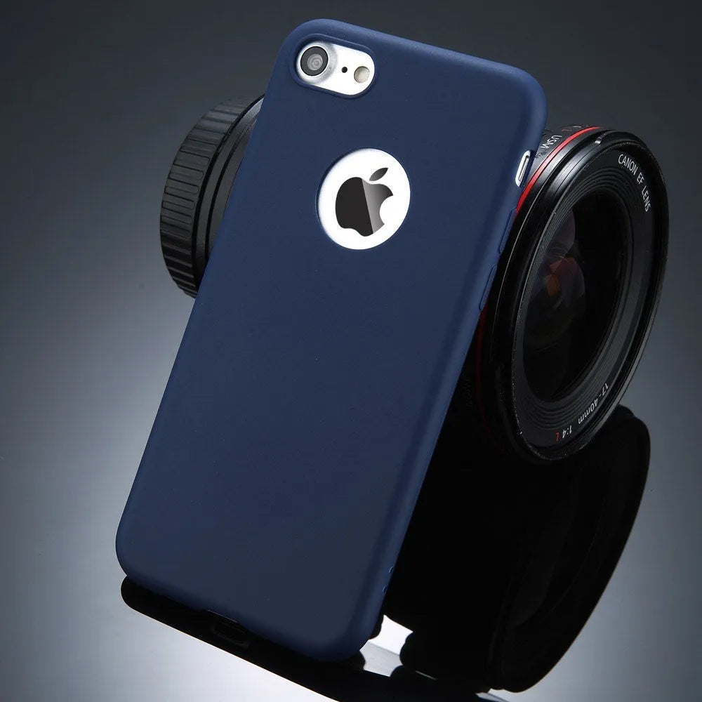 Candy colour soft silicon TPU back cover case for iPhone on a plain background.