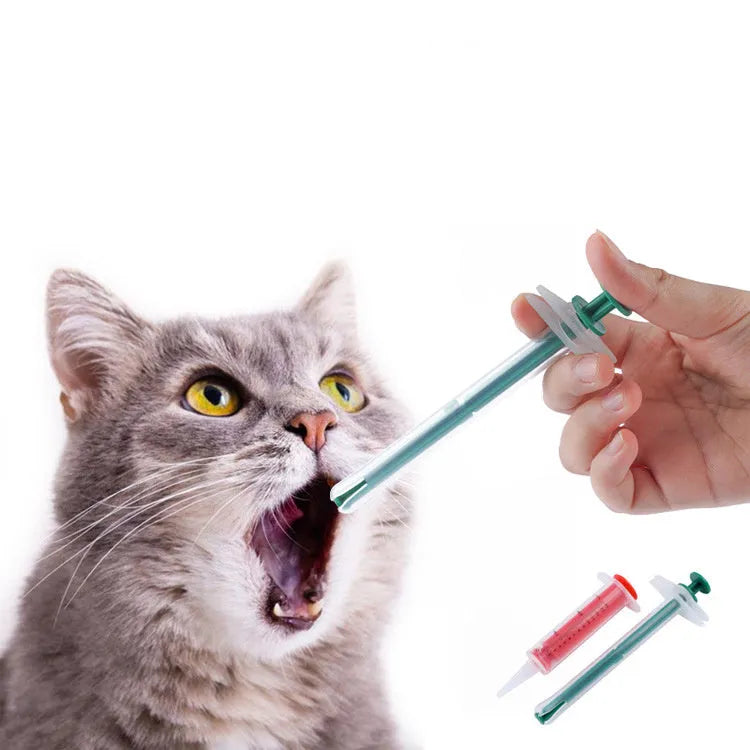 Two silicone pet pill shooter tools with soft tips for administering medication to cats and dogs.