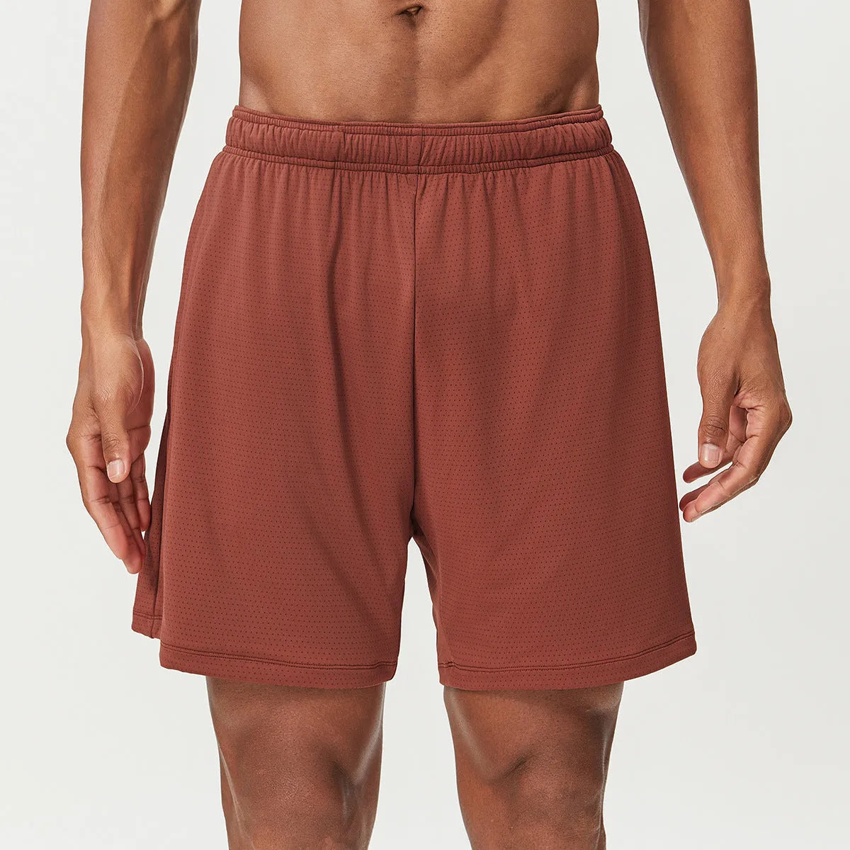 Men's quick-dry double-layer running shorts in various colours on a neutral background.