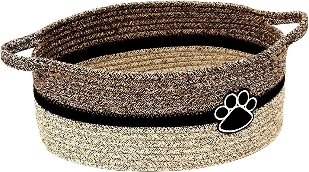 Small light beige handwoven cotton rope storage basket with a wooden handle.