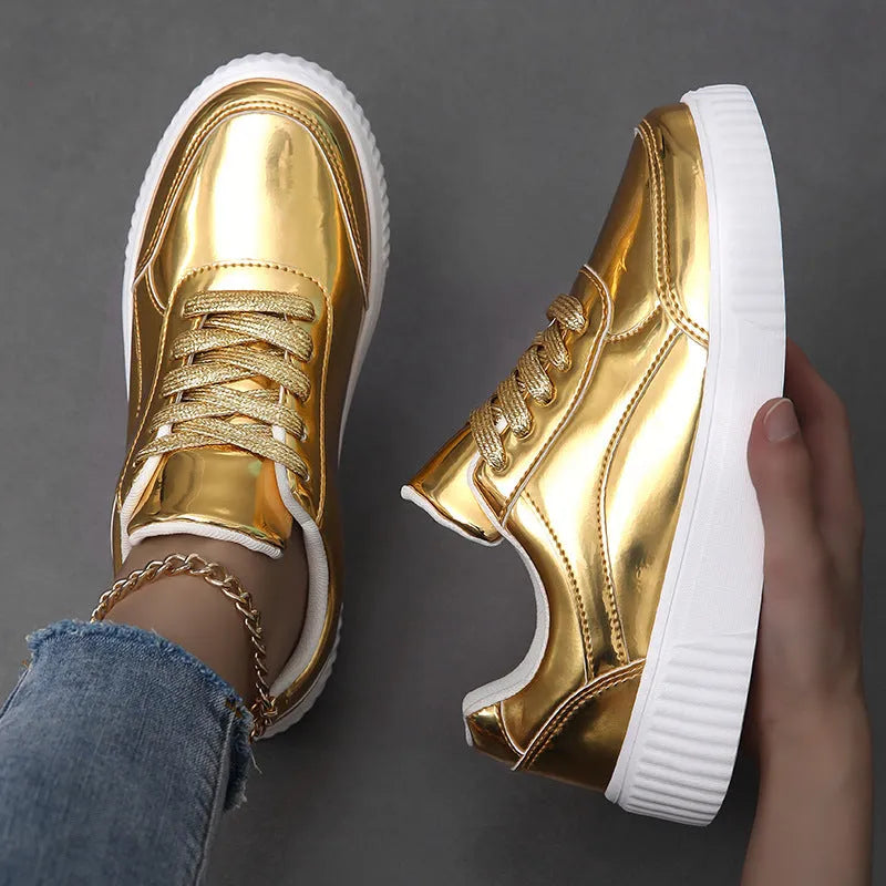 Gold sequinned platform sneaker with round toe and thick MD sole.