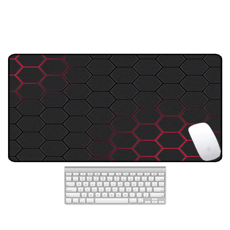 Large natural rubber desk mouse pad with a printed geometric pattern, showing non-slip base.