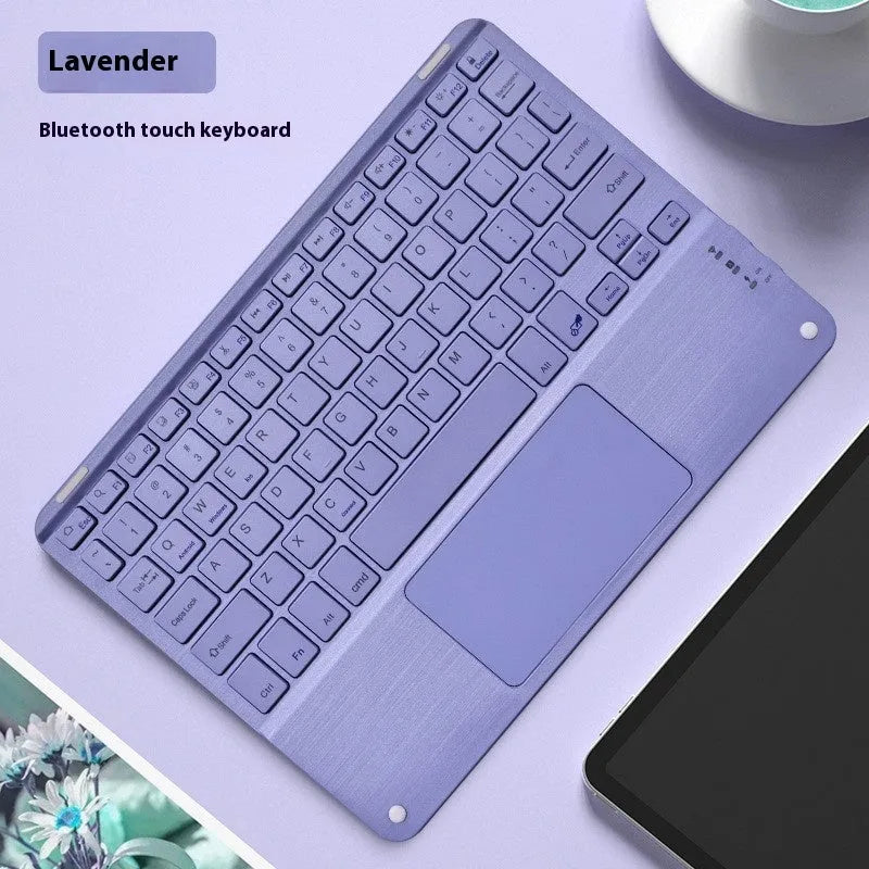 Square hat touch wireless Bluetooth keyboard in assorted colours on a desk.