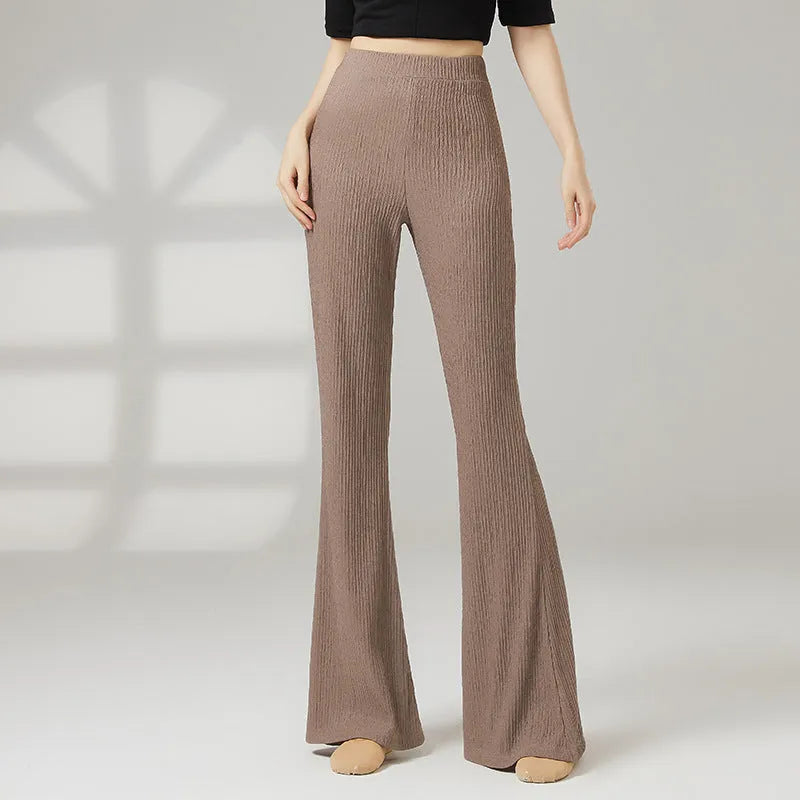Women's solid colour dance practice trousers in polyester fabric for ballet training.