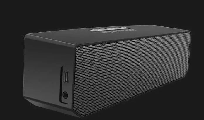 Black BS-6 cloud smart speaker showing compact rectangular design and micro-USB port.