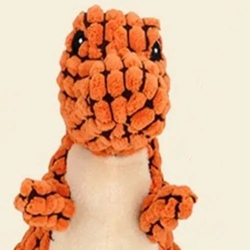 Grey, green, and orange dog sound toy resistant to bites and grinding teeth, measuring 35cm long.
