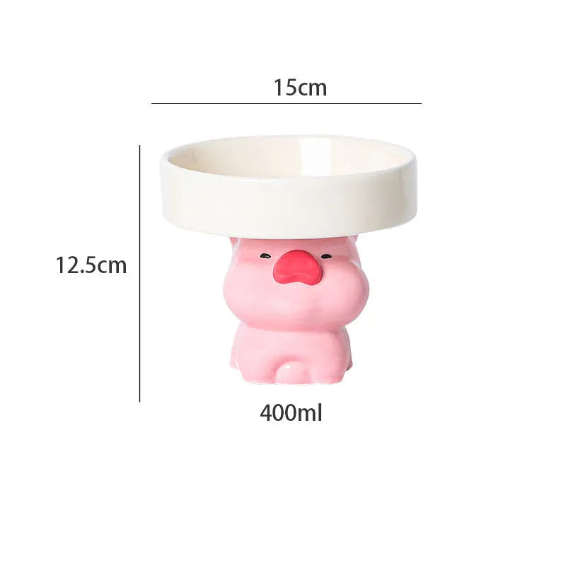 Raised ceramic cat food bowl in animal design, showing elevated height and wide bowl.