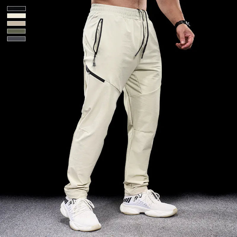 Men's waterproof quick-drying nylon workout trousers in Army Green colour showing mid waist design