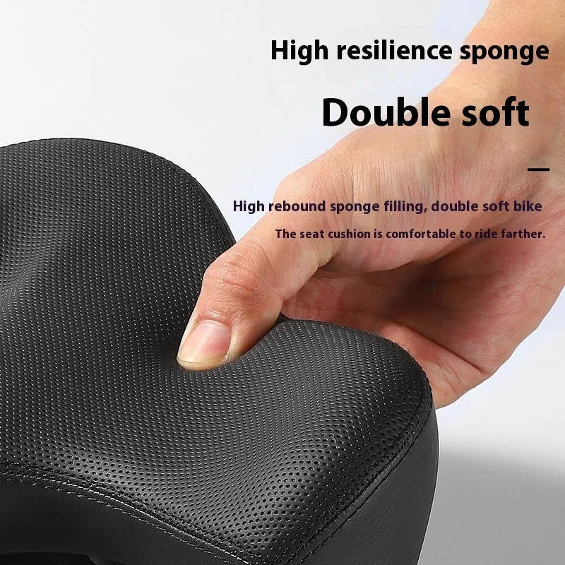 Black bicycle seat cushion with leather surface and polyurethane foam interior for shock absorption