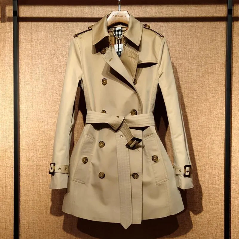 Khaki women's double-breasted trench coat with long flight sleeves, button front.