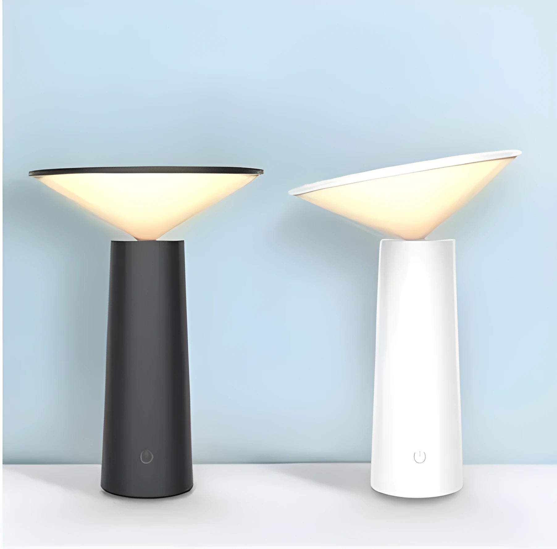 Black or white USB LED desk lamp with touch sensor and adjustable lamp head on a desk