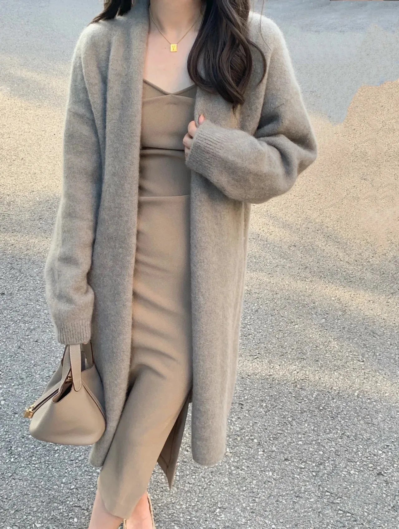 Women's medium length knitted cardigan in khaki colour with V-neck and long sleeves