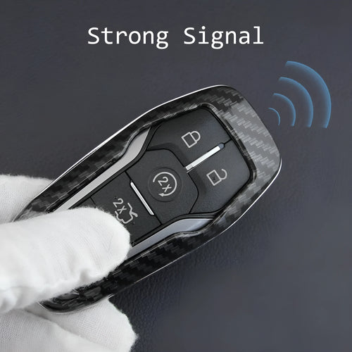 Plastic protective shell for a car key remote, shown in two colour variations