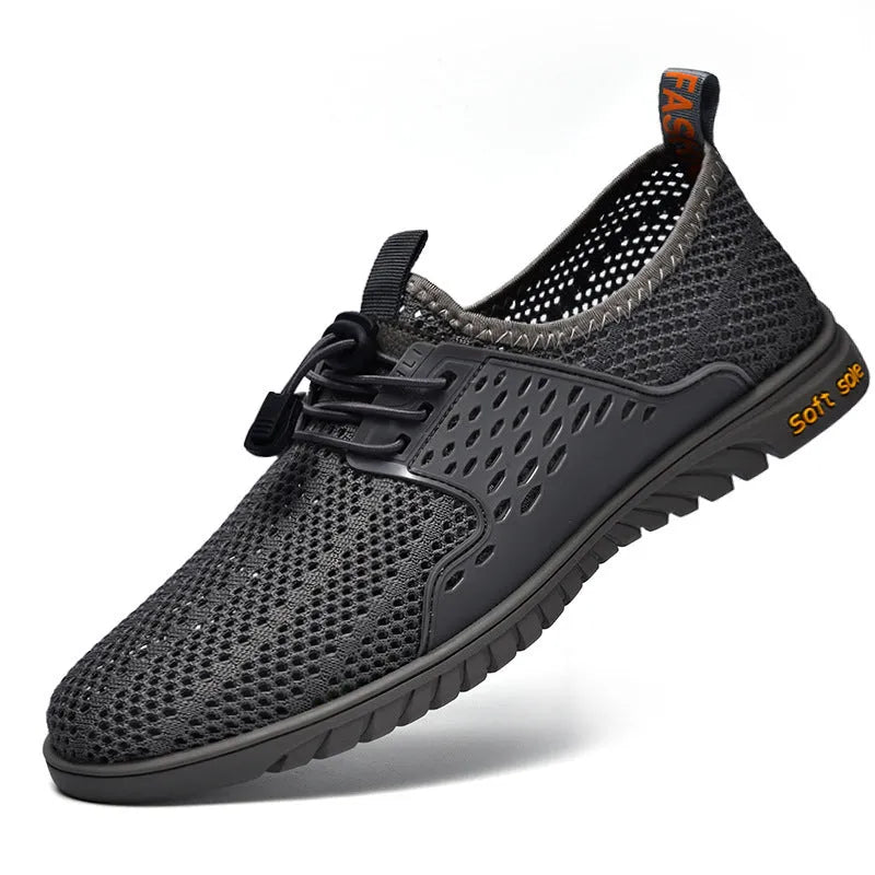 Men's black breathable mesh casual shoes with an elastic band closure and rubber sole