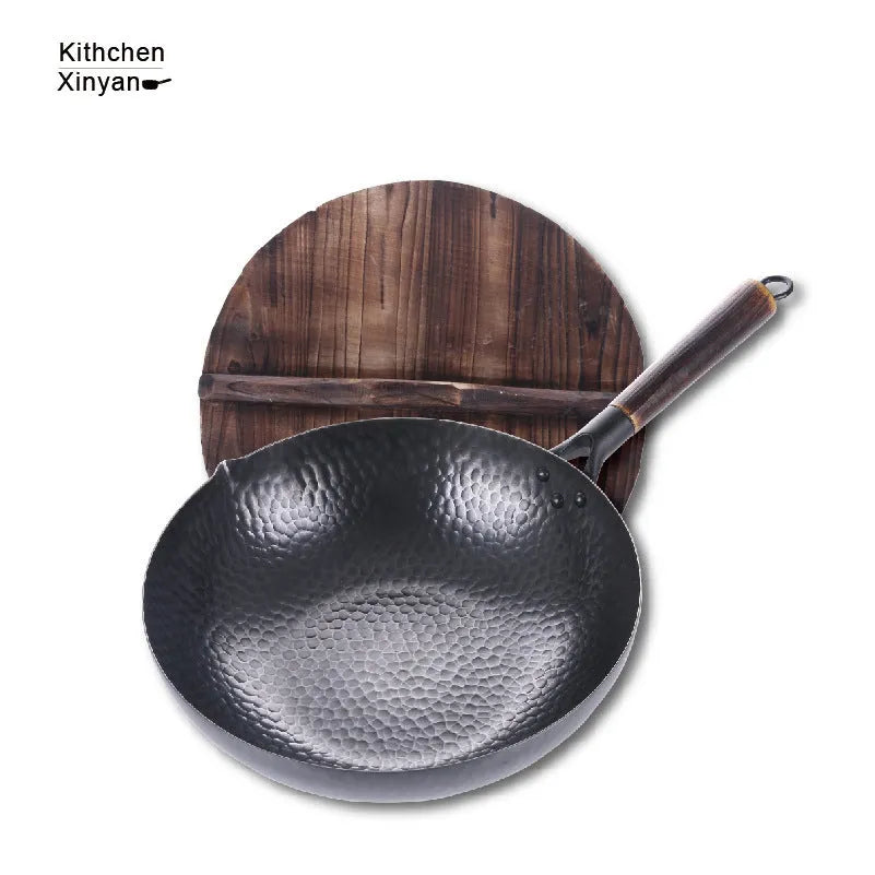 Traditional black iron wok pan with wooden handle measuring 40cm