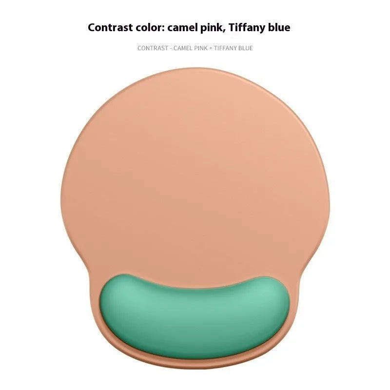 Silicone mouse mat with wrist rest in gradient colour pattern on desk