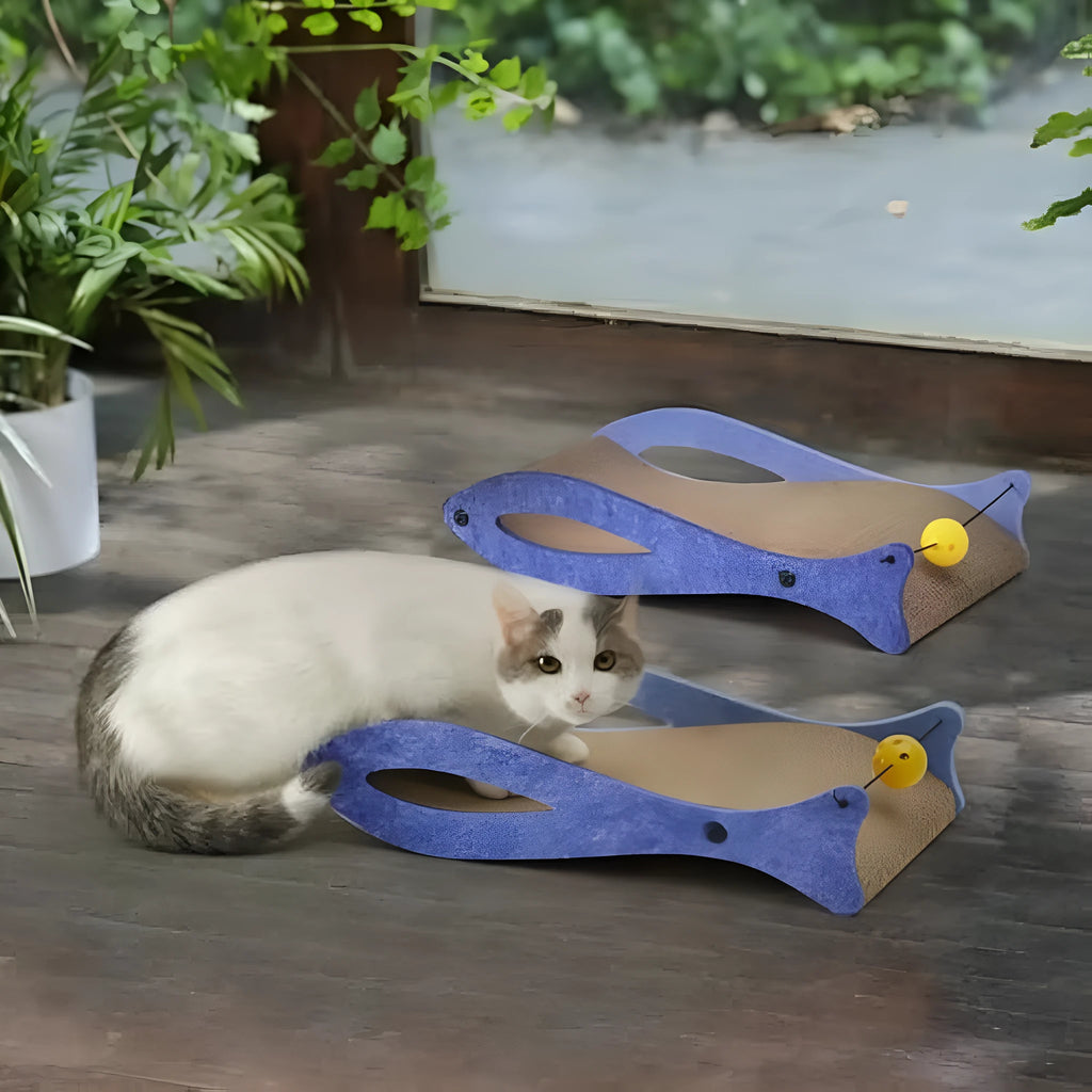Blue fish-shaped cardboard cat scratcher with bell ball toys on elastic cord