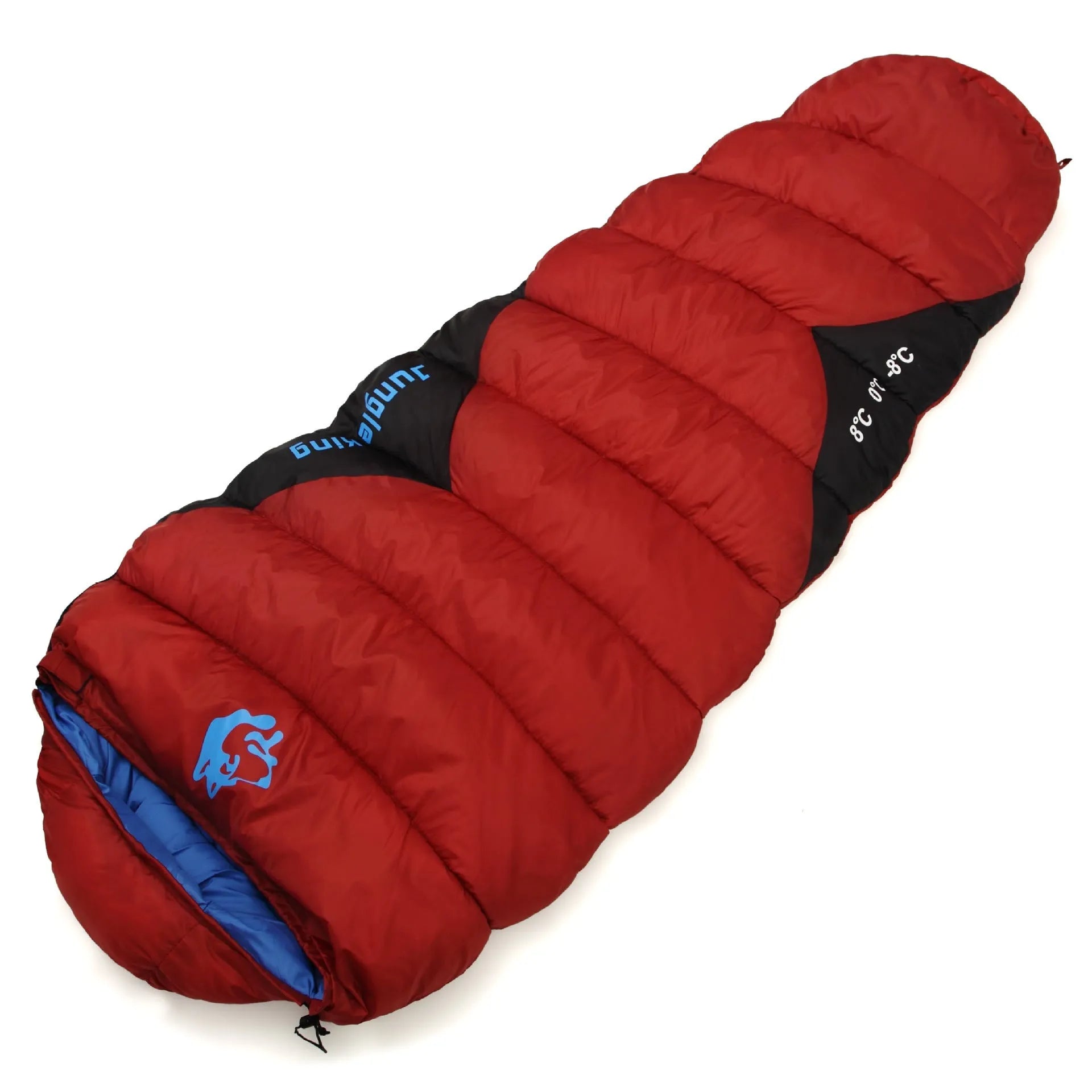 Outdoor cotton sleeping bag in Army Green with its compression storage sack laid beside it.