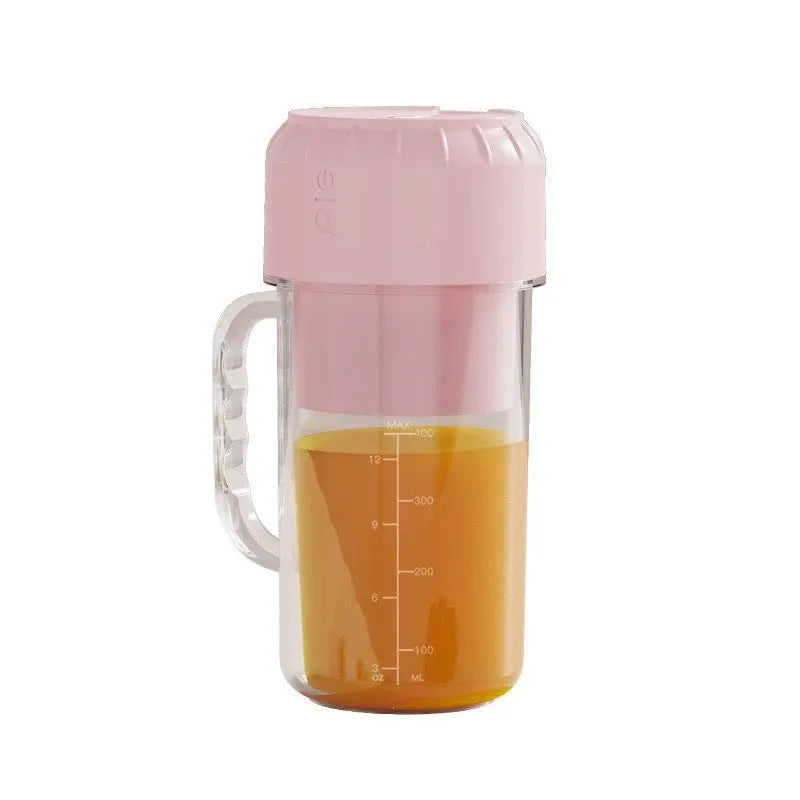 USB-powered portable personal juicer in cherry blossom pink or avocado green with selectable blade options