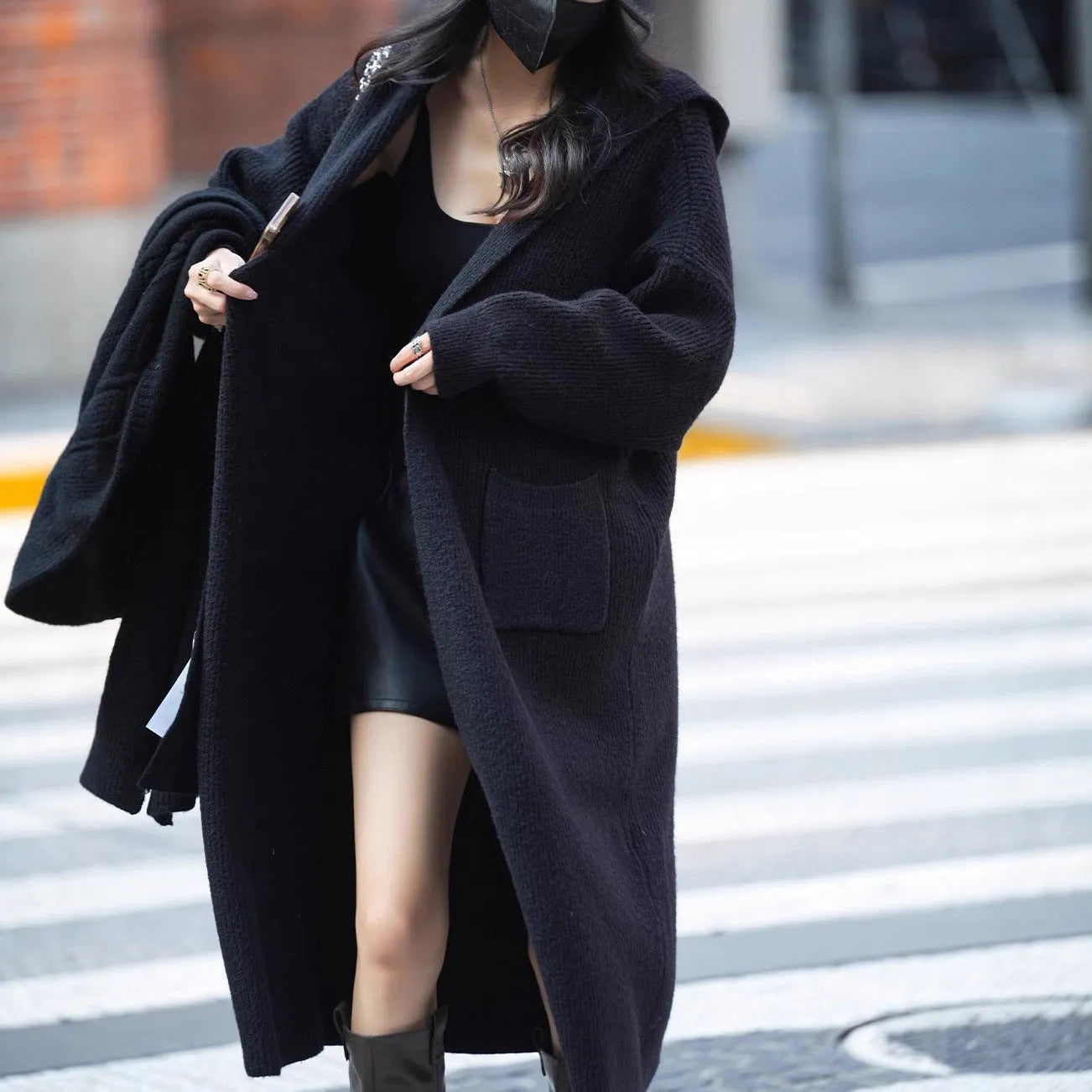 Long grey knitted cardigan with hooded trench coat design and regular long sleeves
