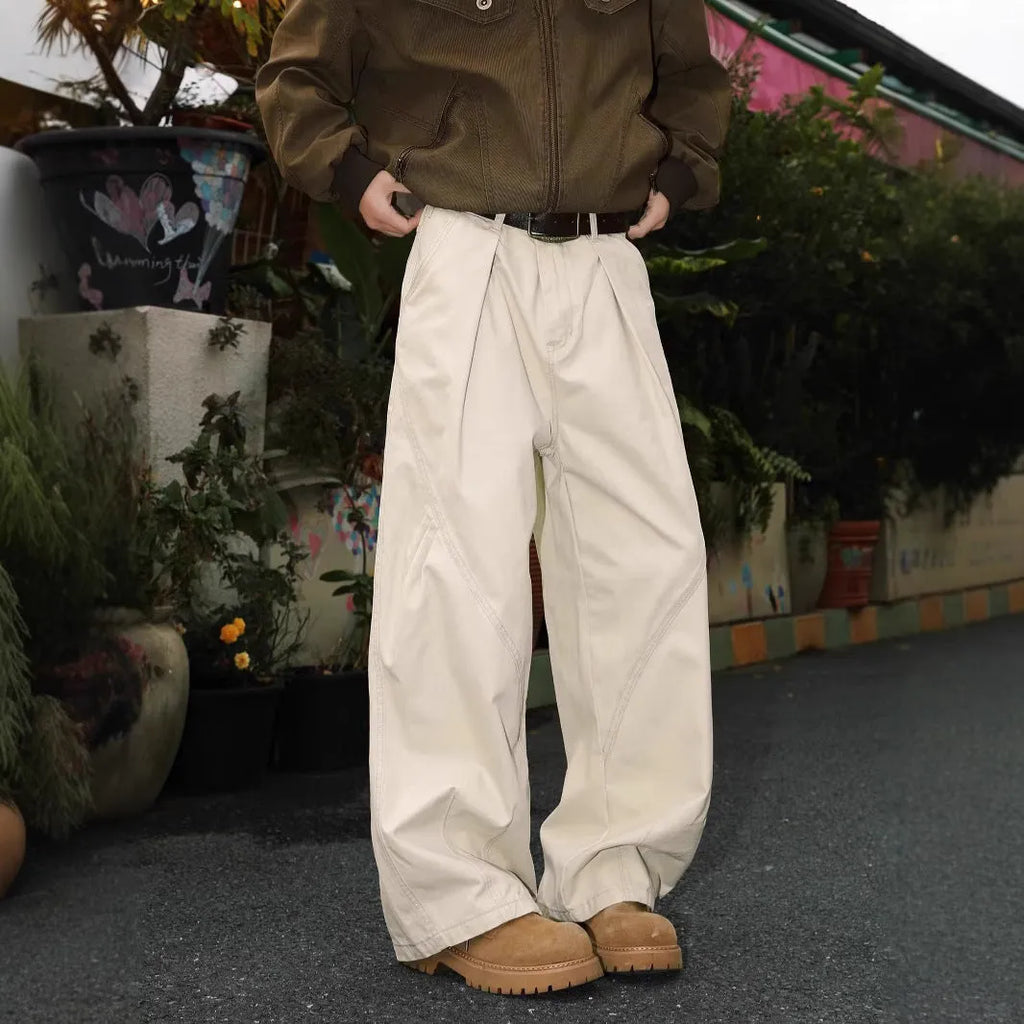 Men's pleated straight leg trousers in apricot colour with stripe pattern and loose fit design