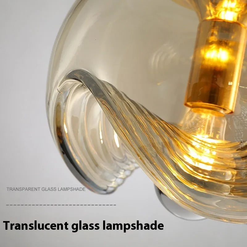 Modern minimalist glass chandelier bedside lamp with 250mm size shown in transparent, amber, and smoky grey colour options