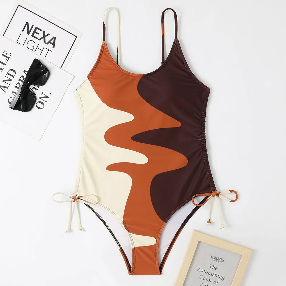 Women's sleeveless one-piece swimsuit in blue colour with backless design for swimming sports