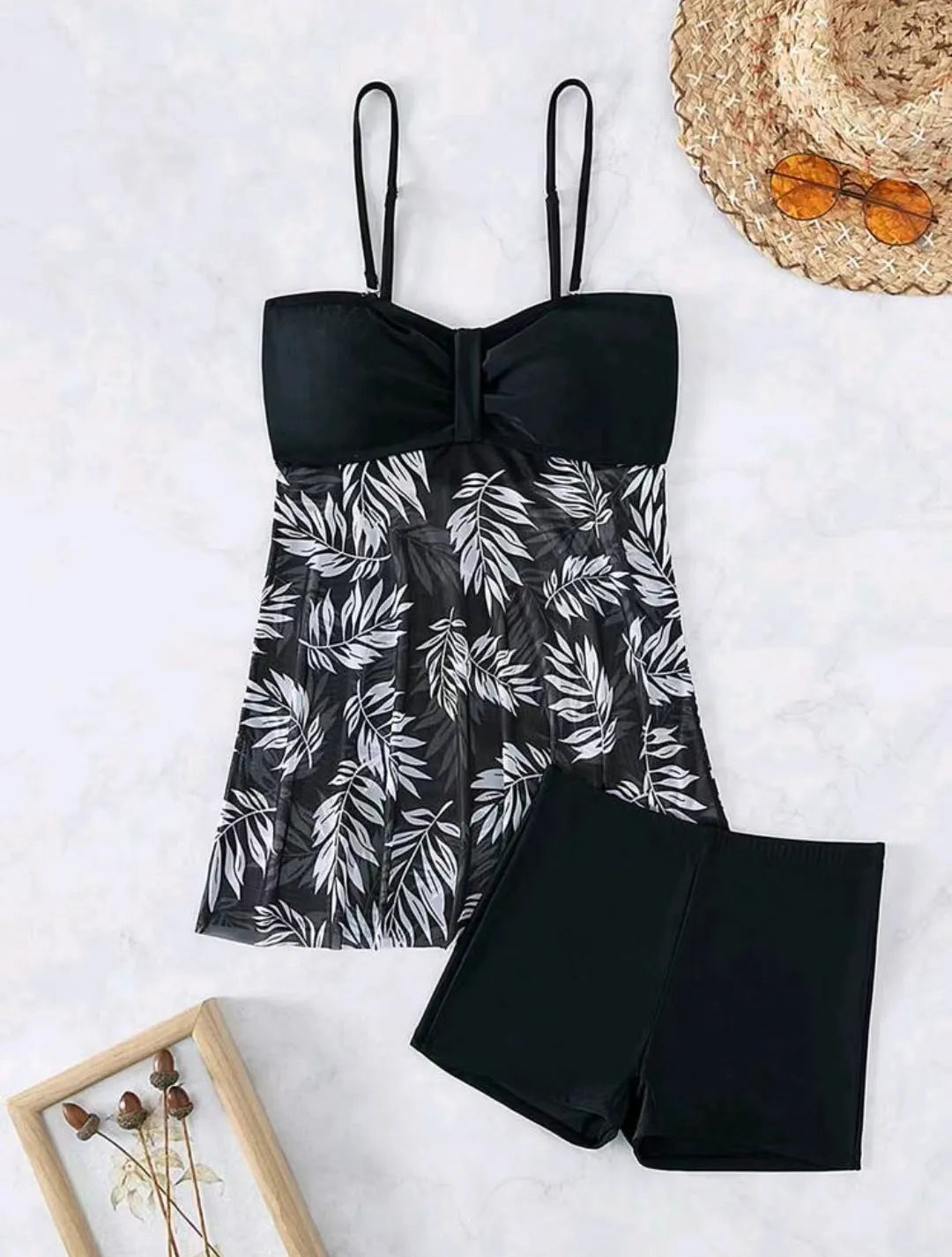 Women's high-waist mesh swimsuit briefs in black, blue, and peacock green on a white background.
